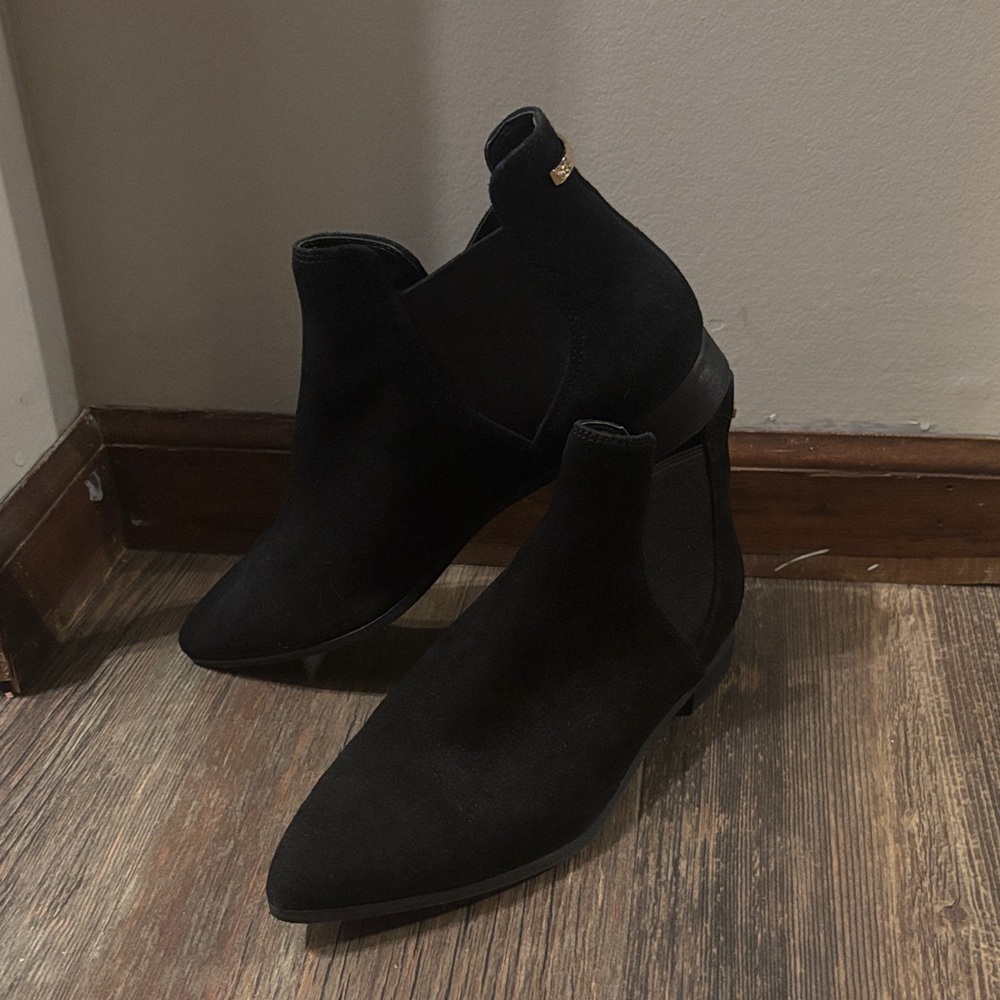 Women’s size 9. Cole Haan pointed toe ankle bootie. Black.
